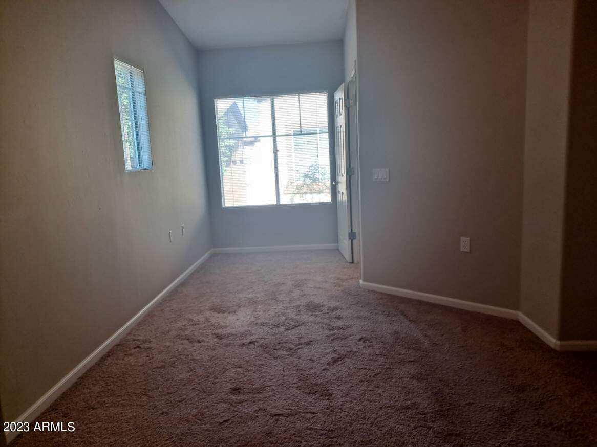 1920 East Bell Road, Unit 1114 Phoenix, AZ 85022 - Photo 11 of 18 an empty room with windows