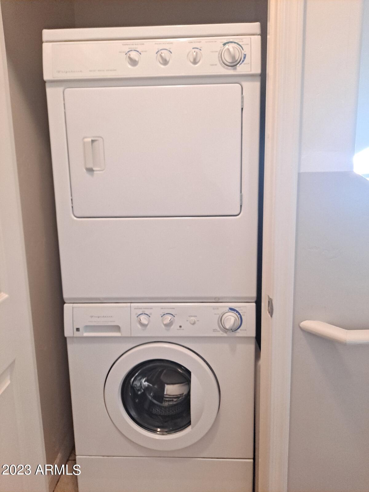 1920 East Bell Road, Unit 1114 Phoenix, AZ 85022 - Photo 18 of 18 a close up view of washer and dryer