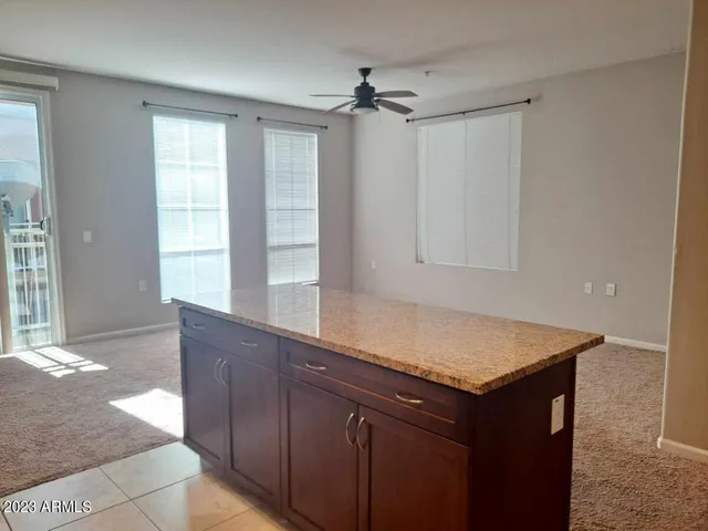 a kitchen with a sink and a window