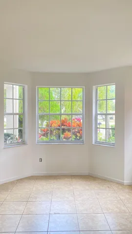 an empty room with windows