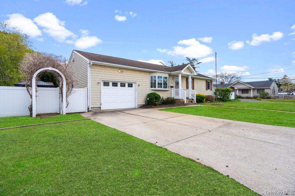 101 Sexton Road West Babylon, NY 11704 - Photo 4 of 33 a front view of a house with garden