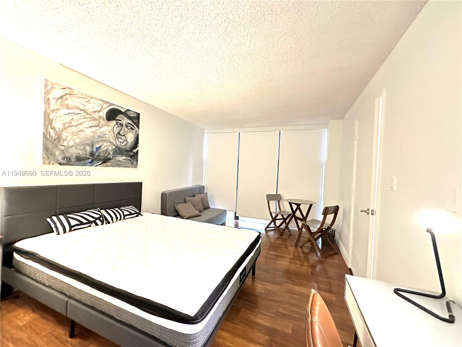 17011 North Bay Road, Unit 202 Sunny Isles Beach, FL 33160 - Photo 13 of 32 a view of a room with lounge chair