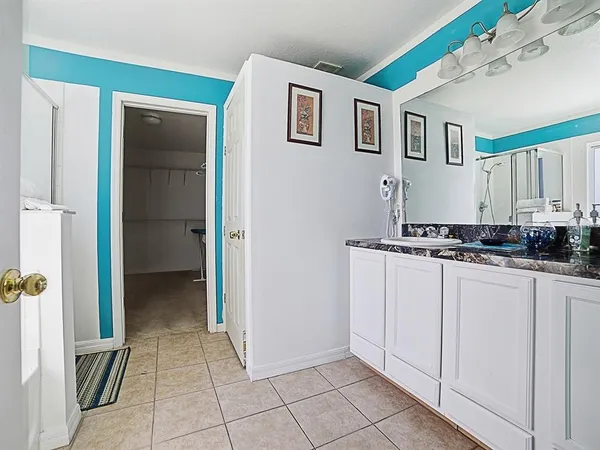 a bathroom with a shower and a tub