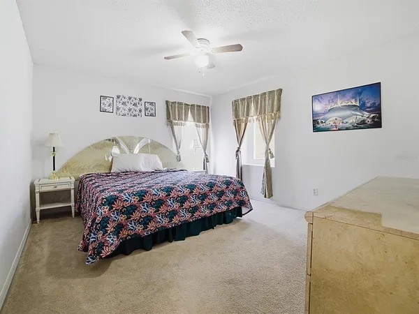 a view of a balcony with wooden floor