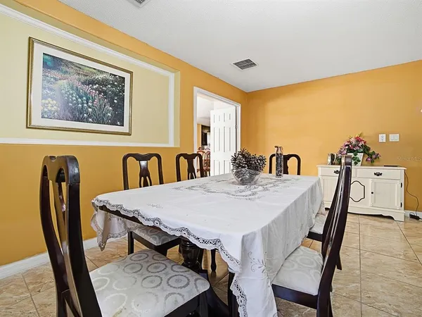 a view of a dining room with furniture