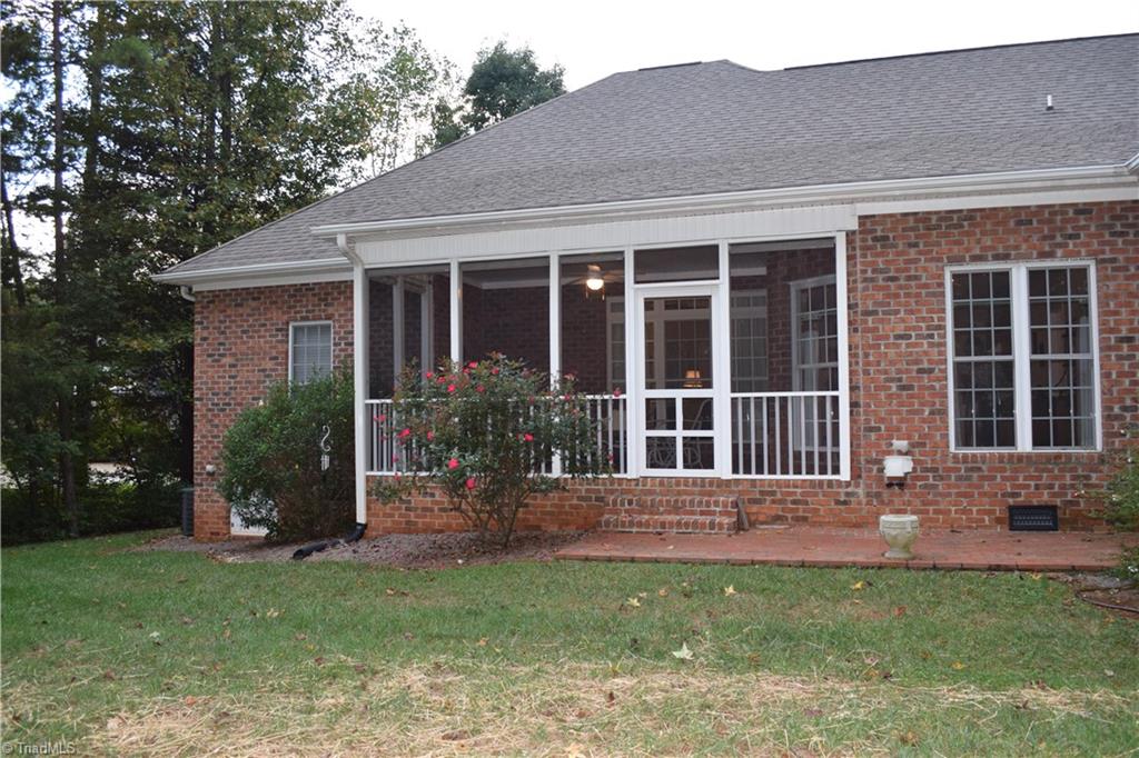 149 Live Oaks Road Advance, NC 27006 - Photo 4 of 24 Lovely screen porch