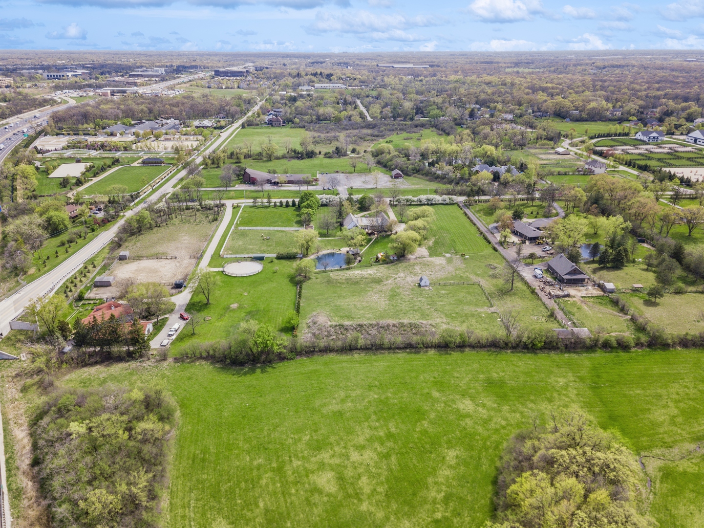 14080 West Old School Road Mettawa, IL 60048 - Photo 47 of 64 an aerial view of residential houses with outdoor space and trees