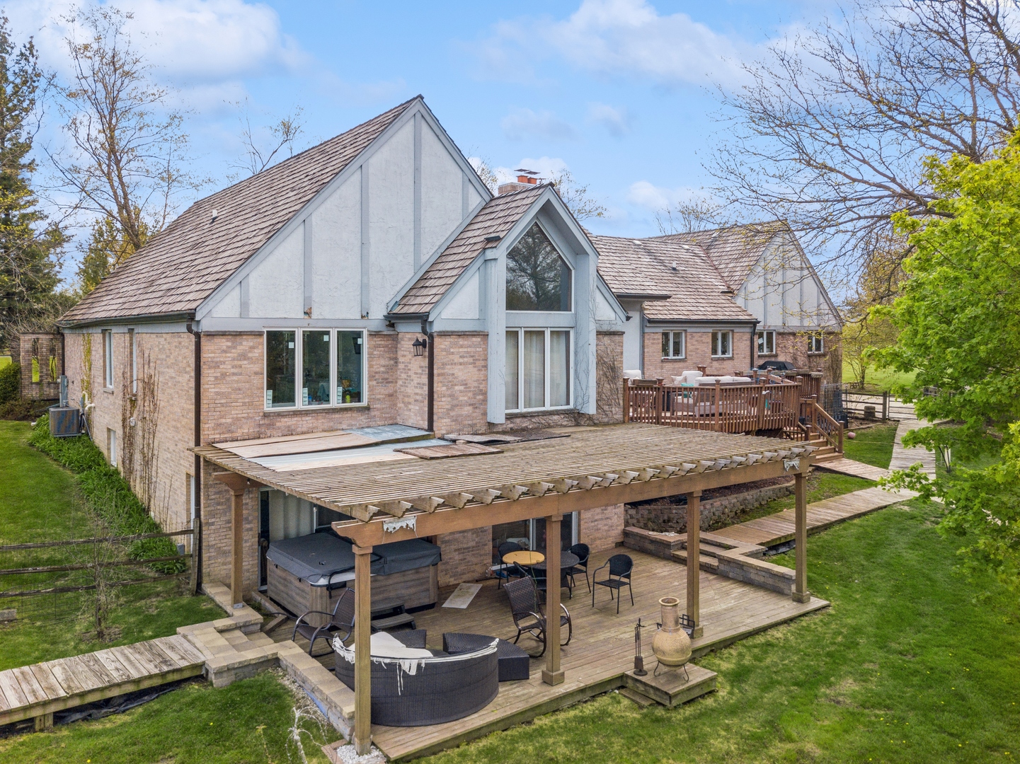 14080 West Old School Road Mettawa, IL 60048 - Photo 56 of 61 a view of house with backyard outdoor seating and green space