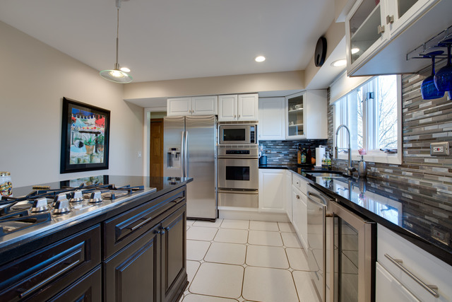 14080 West Old School Road Mettawa, IL 60048 - Photo 10 of 64 a kitchen with stainless steel appliances granite countertop a sink stove and refrigerator