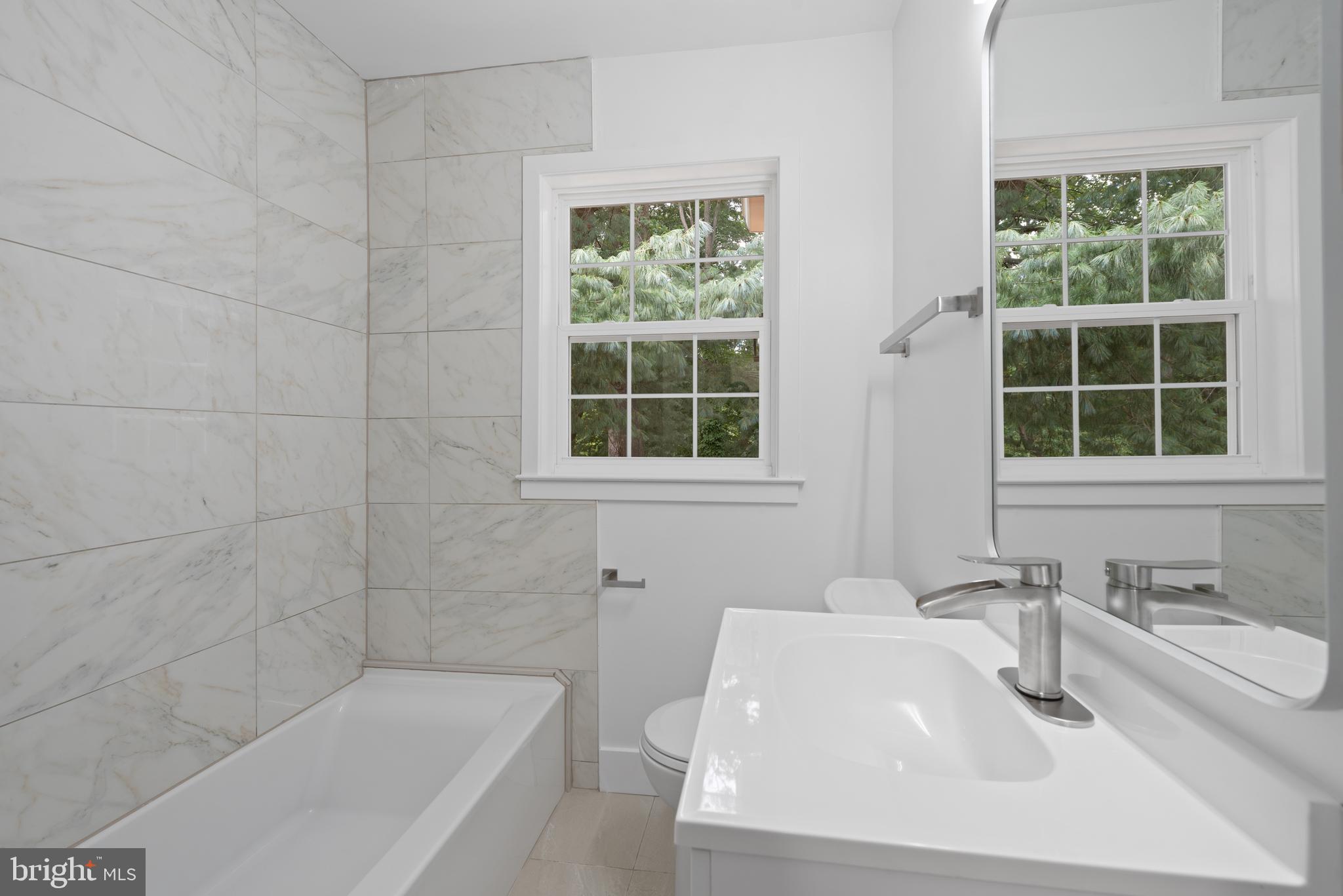 215 Patuxent Road Laurel, MD 20707 - Photo 12 of 27 Main floor bath with shower/tub combo