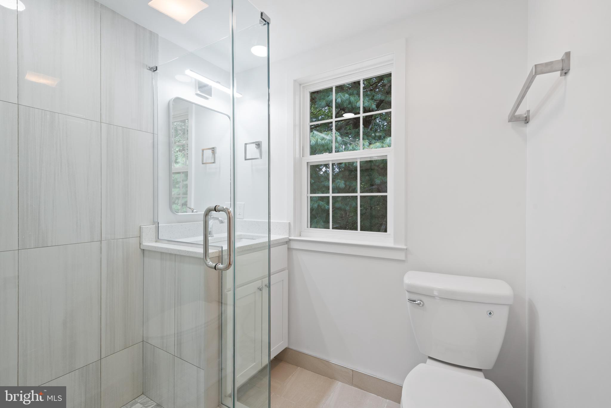215 Patuxent Road Laurel, MD 20707 - Photo 17 of 27 2nd floor bath with new shower w/glass doors