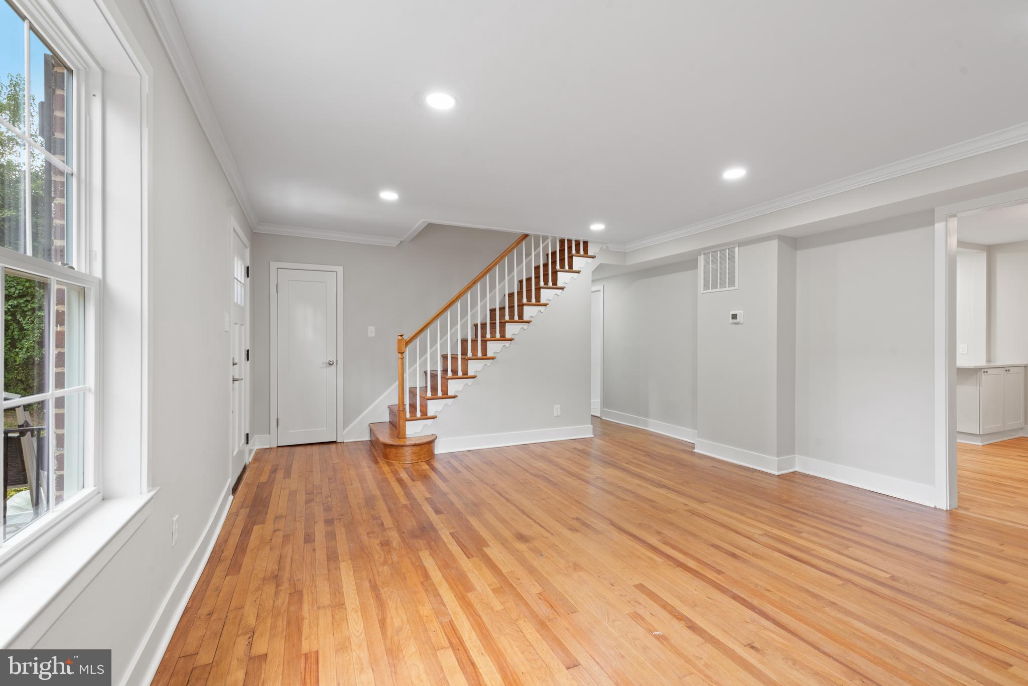215 Patuxent Road Laurel, MD 20707 - Photo 3 of 27 Large living room with newly finished wood floors