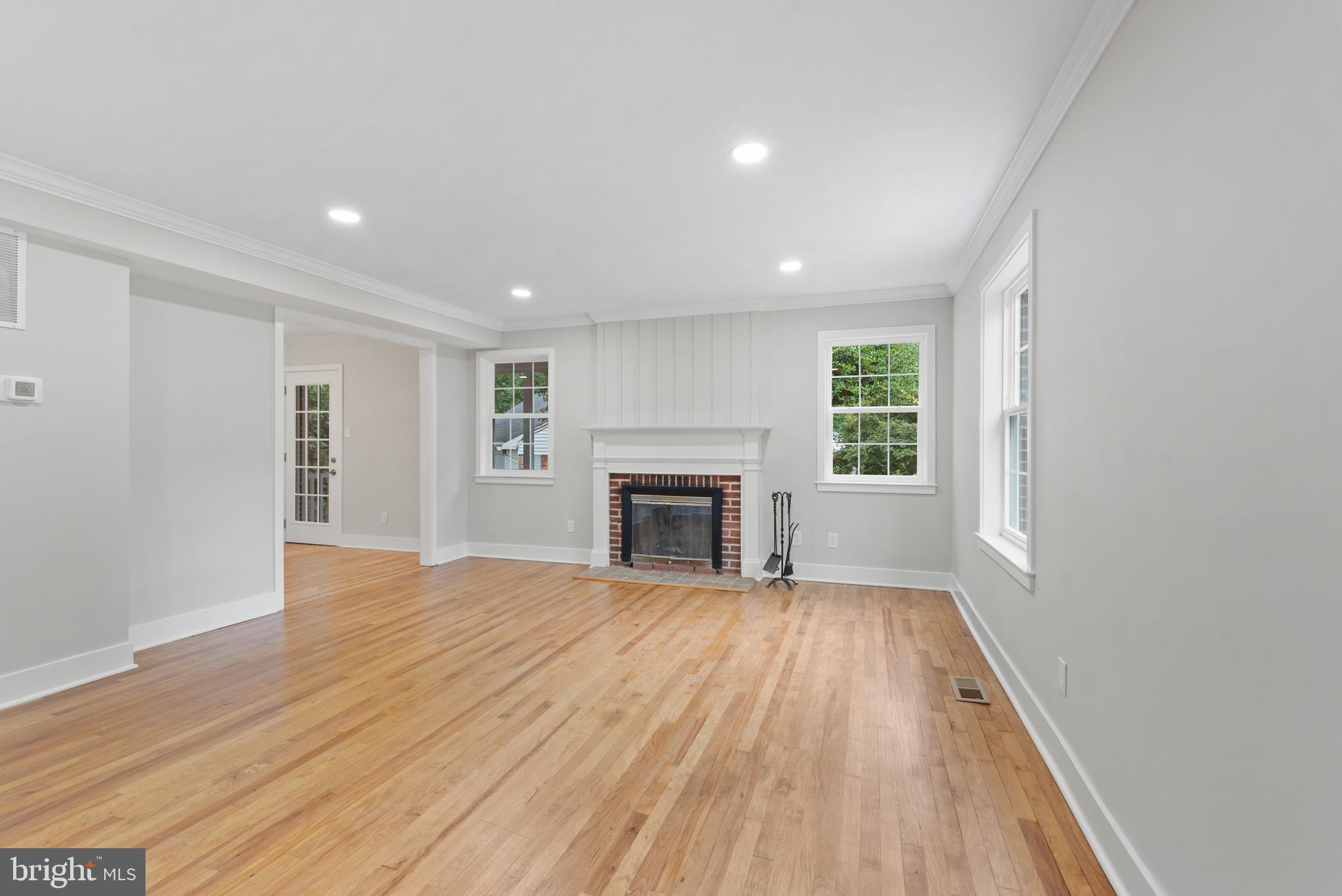215 Patuxent Road Laurel, MD 20707 - Photo 4 of 27 Living room with fireplace
