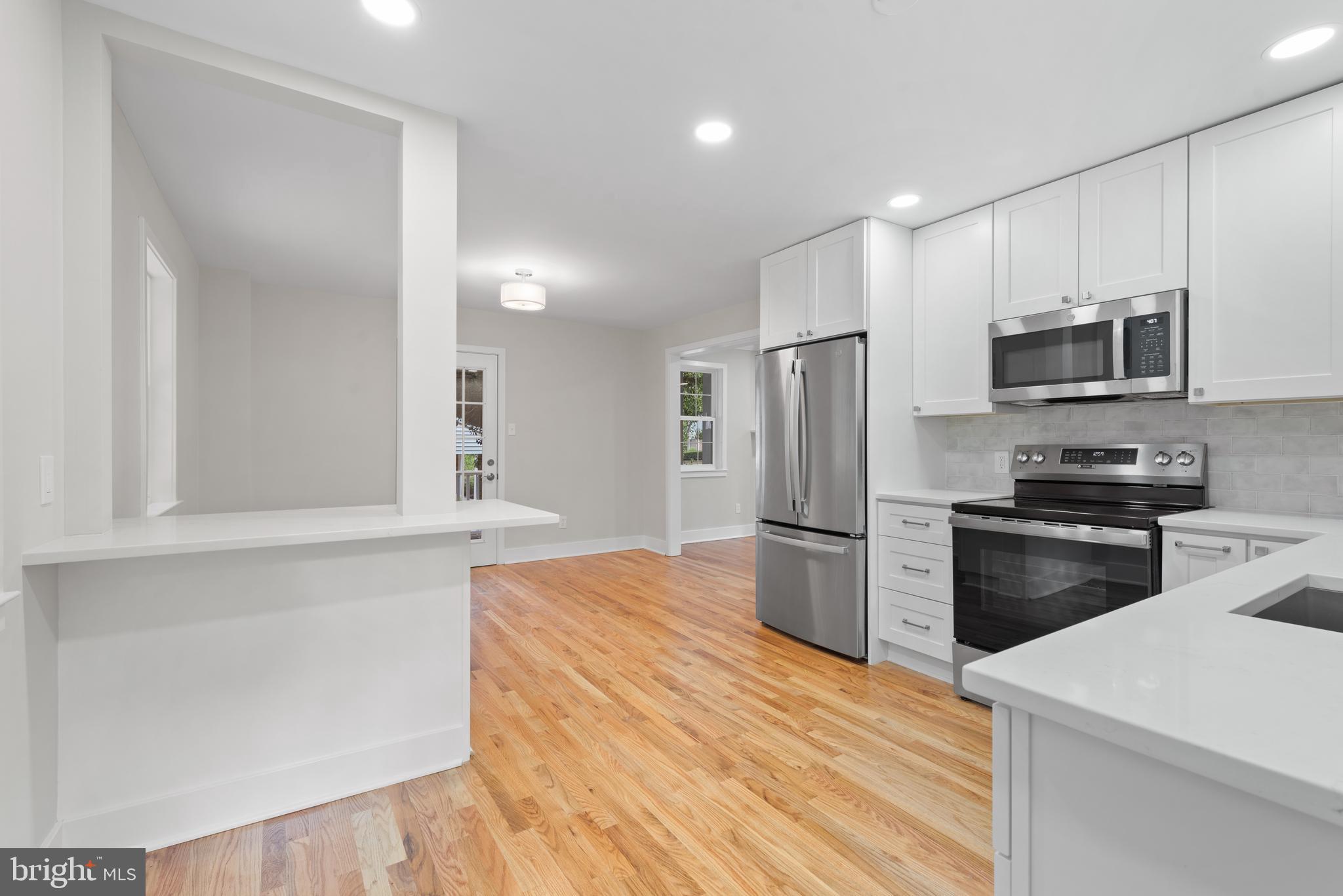 215 Patuxent Road Laurel, MD 20707 - Photo 7 of 27 Breakfast bar in kitchen