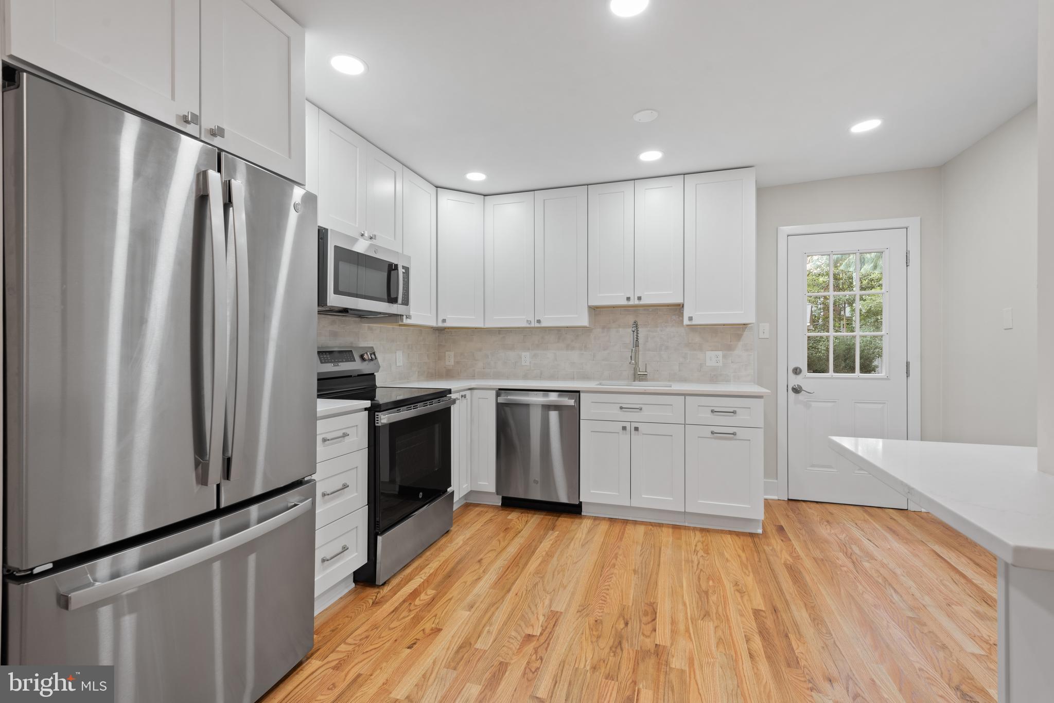 215 Patuxent Road Laurel, MD 20707 - Photo 8 of 27 Quartz counters and stainless appliances