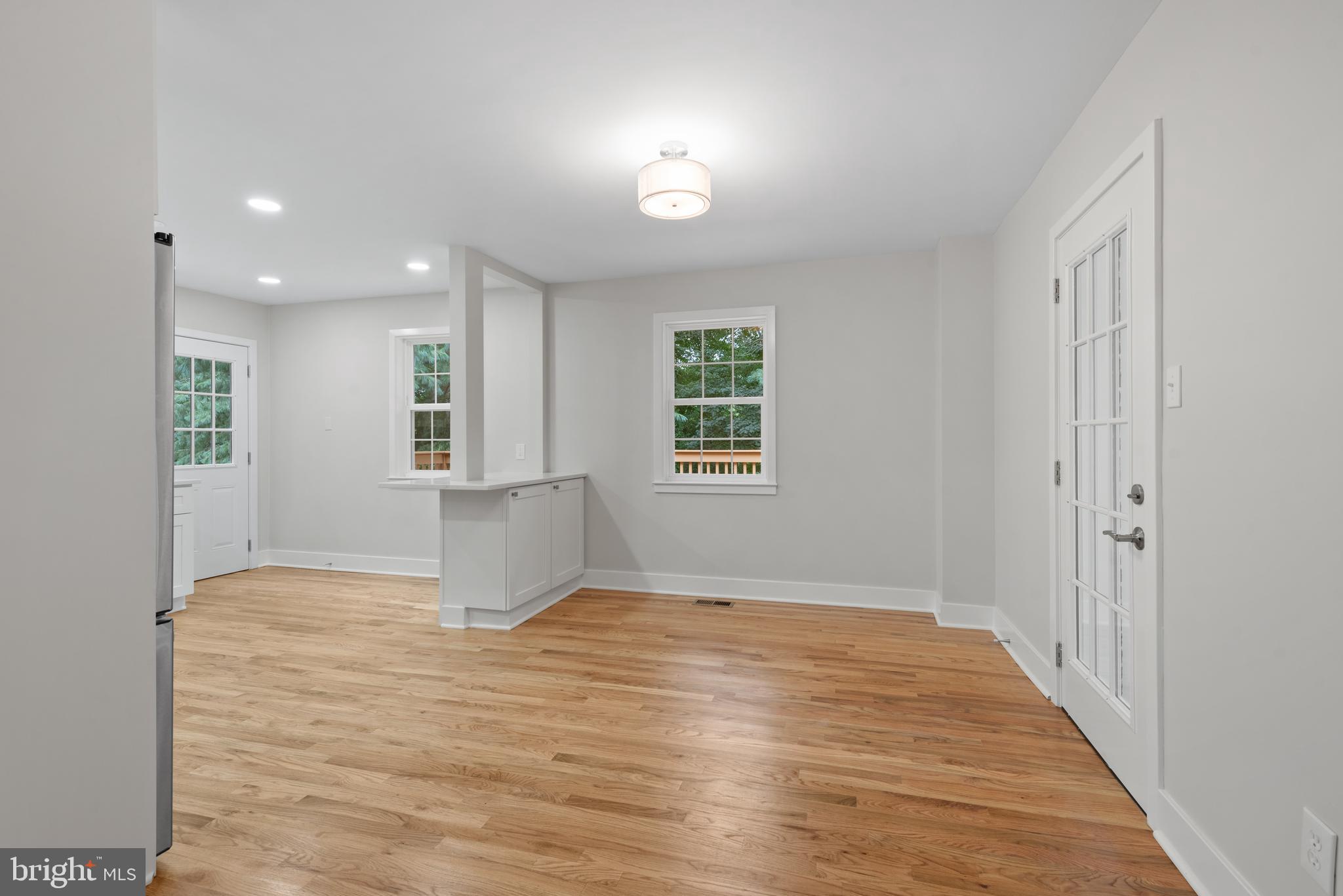 215 Patuxent Road Laurel, MD 20707 - Photo 10 of 27 Dining room with screen porch access