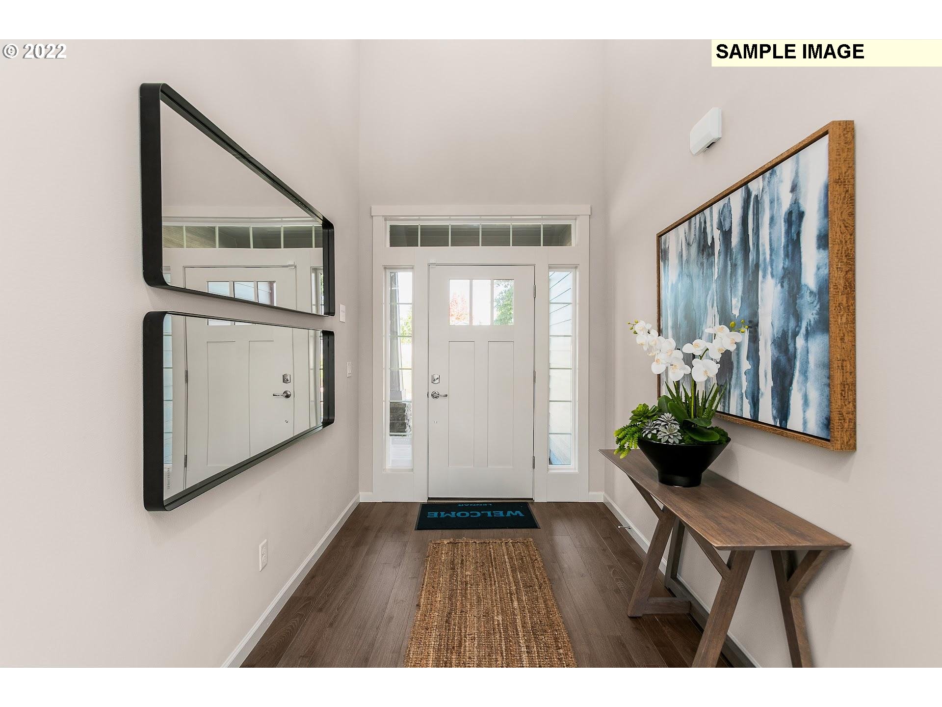37528 Coho Street Sandy, OR 97055 - Photo 3 of 23 a living room with furniture and wooden floor