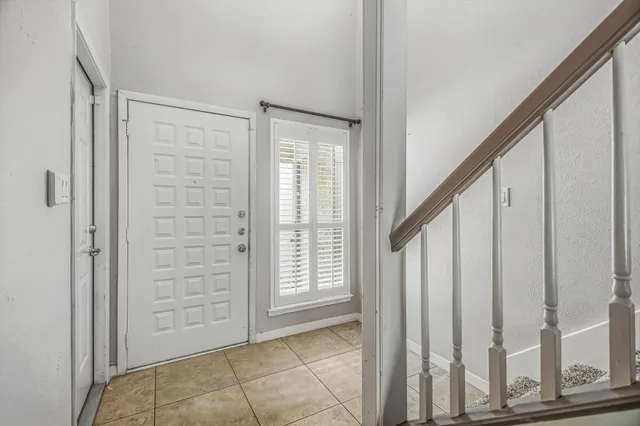 a view of an entryway with staircase