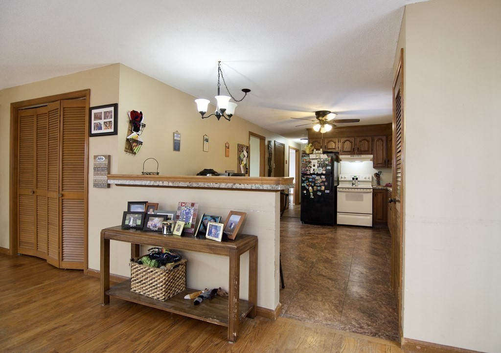 102 Stebbins Road Monson, MA 01057 - Photo 12 of 35 a living room with furniture and wooden floor