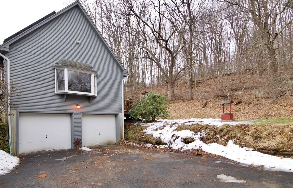 102 Stebbins Road Monson, MA 01057 - Photo 3 of 35 a front view of a house with a yard