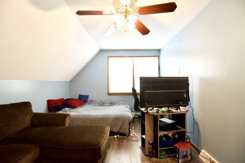 102 Stebbins Road Monson, MA 01057 - Photo 34 of 35 a bedroom with a bed and a flat tv screen