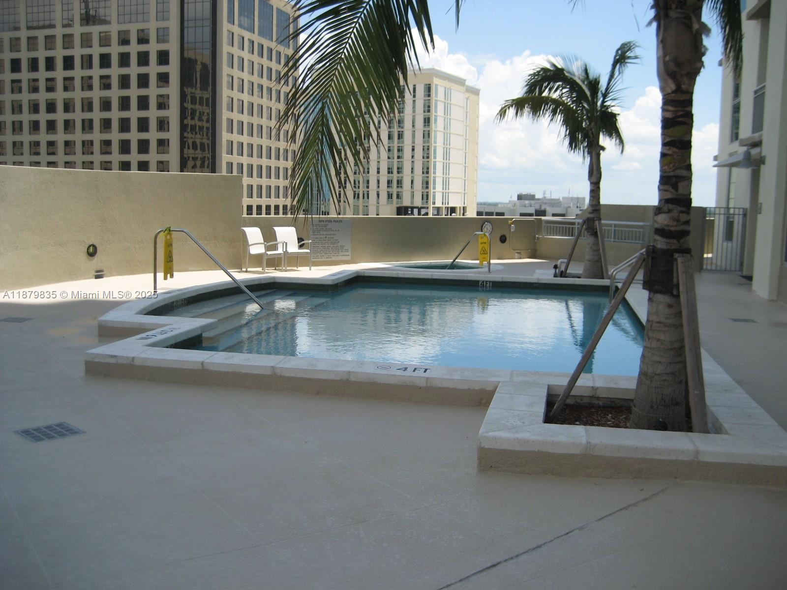 9066 Southwest 73rd Court, Unit 1802 Miami, FL 33156 - Photo 12 of 12 an ocean view with a outdoor space