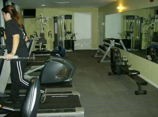 a view of a swimming pool with outdoor seating and yard