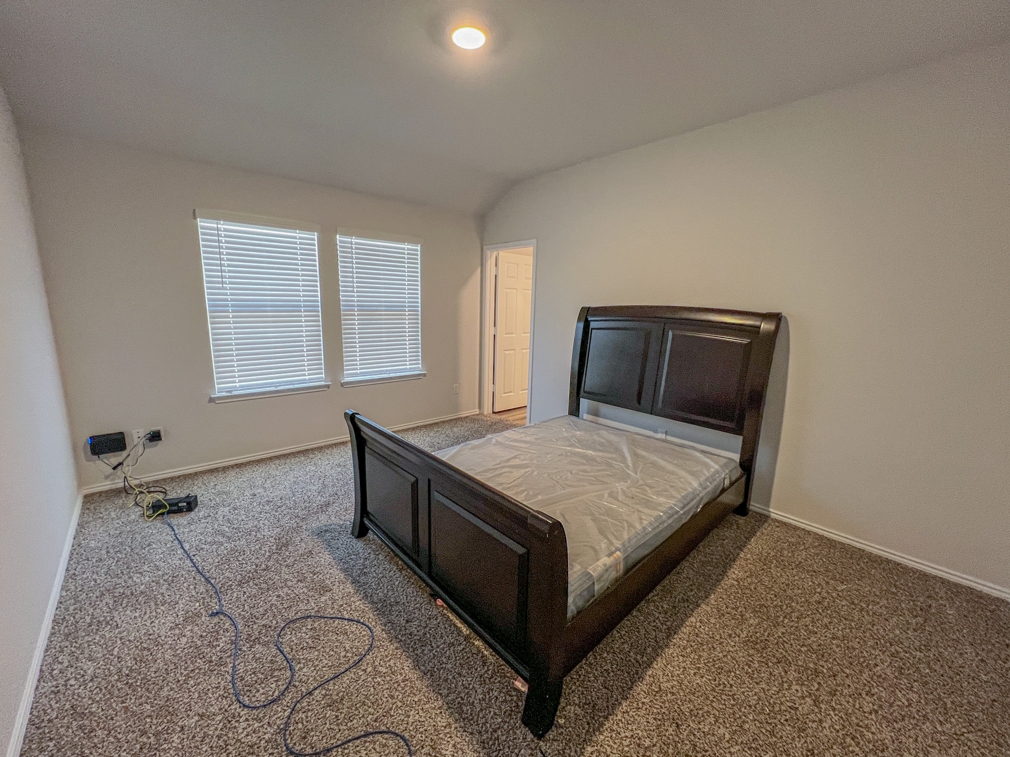 100 Taggart Trail Jarrell, TX 76537 - Photo 14 of 18 a bedroom with a bed and window