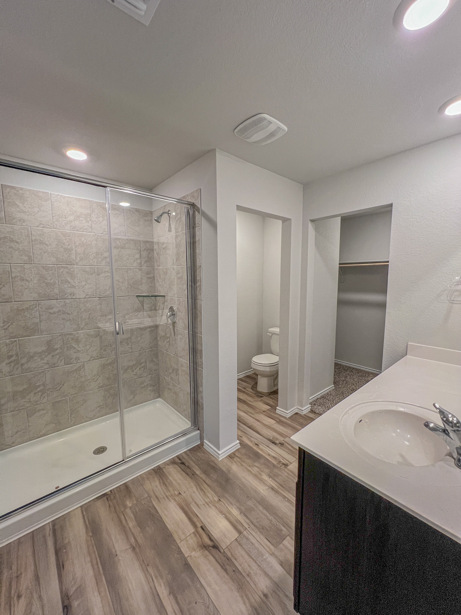 100 Taggart Trail Jarrell, TX 76537 - Photo 15 of 18 a bathroom with a shower and a sink