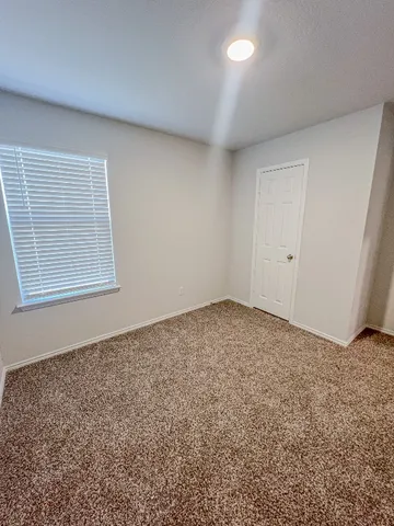 an empty room with a workbench