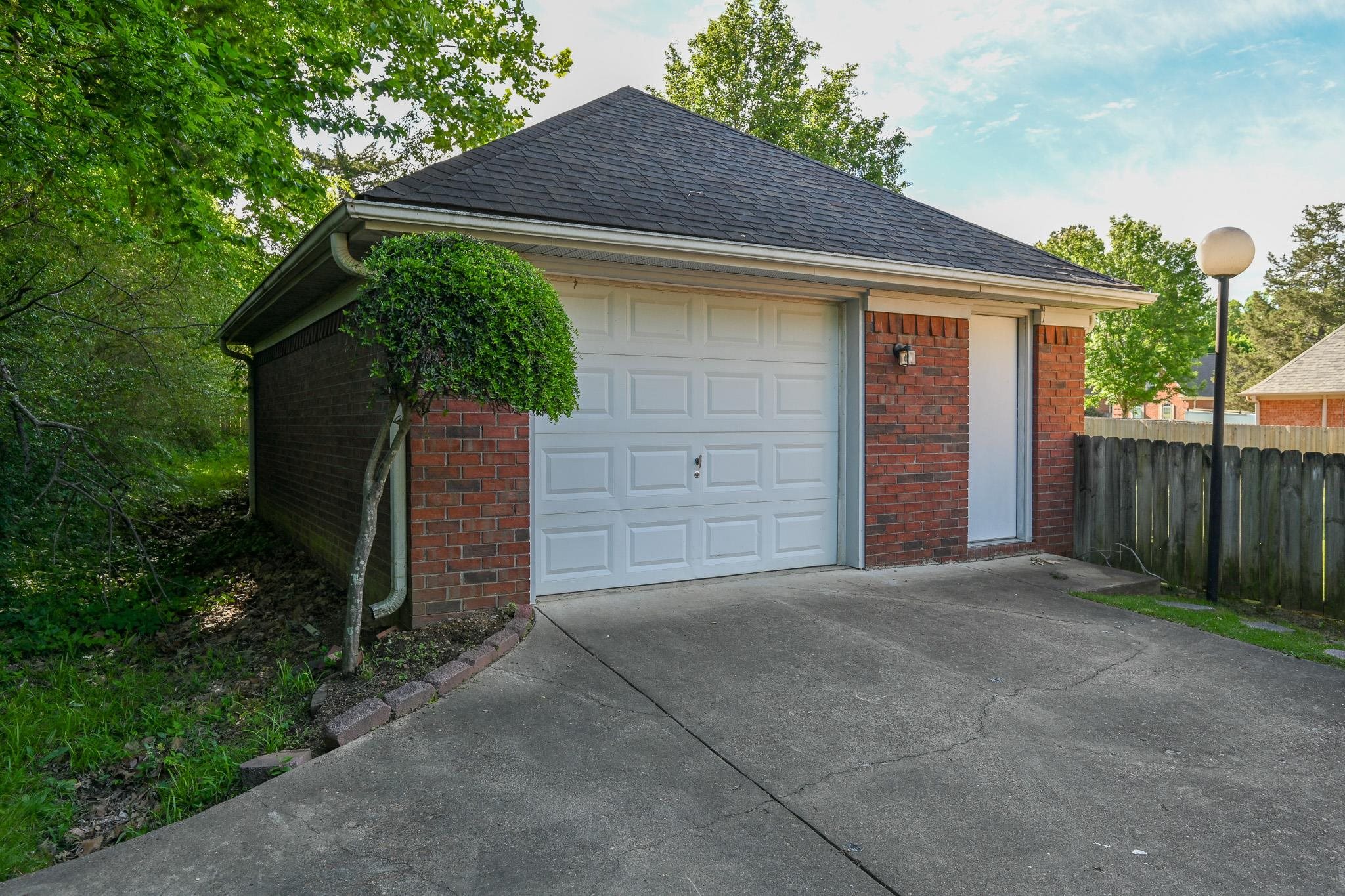 3746 Broadway Road Bartlett, TN 38135 - Photo 29 of 39 Garage is wired and has floored attic space for plenty of storage.