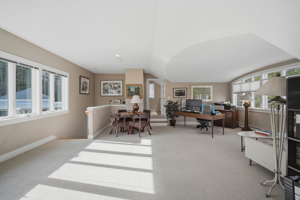 24 Prynne Ridge Road Longmeadow, MA 01106 - Photo 27 of 42 a living room with furniture and a table