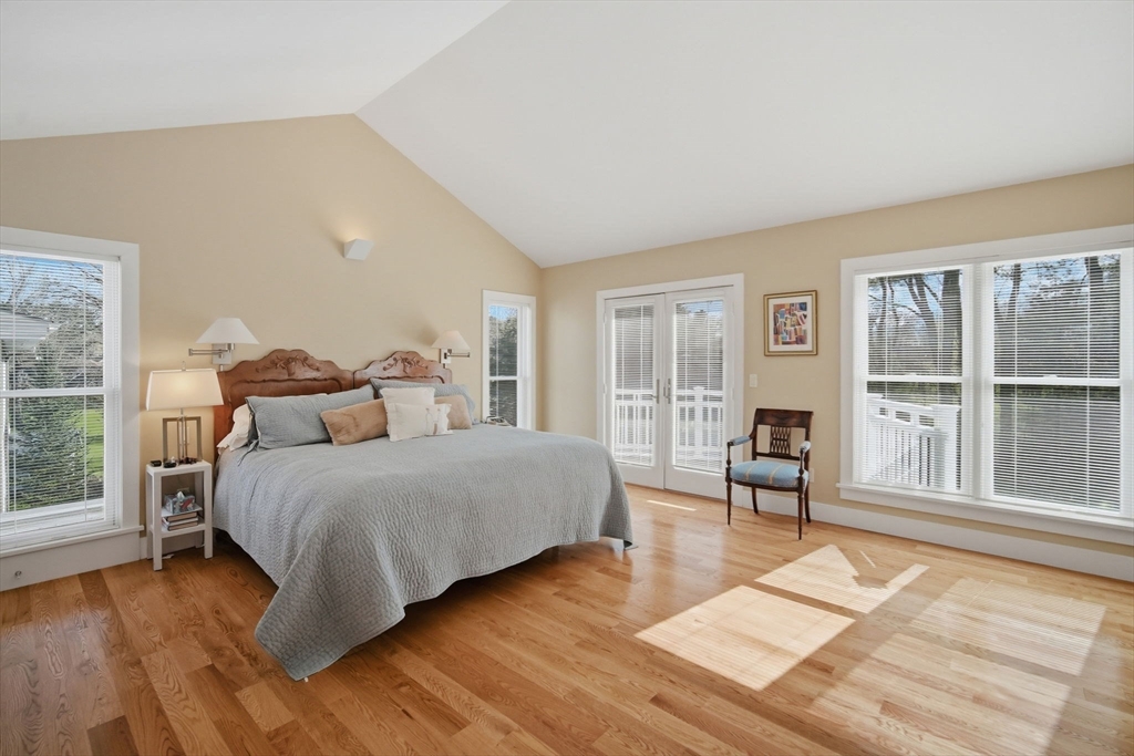 24 Prynne Ridge Road Longmeadow, MA 01106 - Photo 29 of 42 a spacious bedroom with a bed and a large window