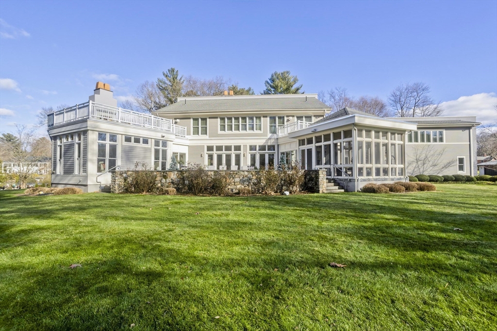 24 Prynne Ridge Road Longmeadow, MA 01106 - Photo 3 of 42 a front view of a house with a garden
