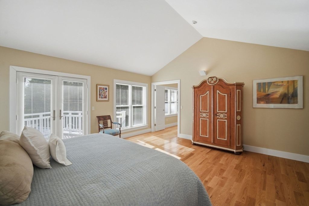 24 Prynne Ridge Road Longmeadow, MA 01106 - Photo 31 of 42 a spacious bedroom with a bed closet and a large window