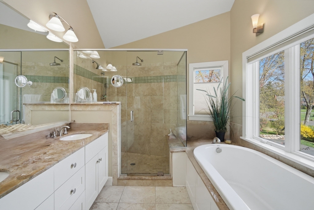 24 Prynne Ridge Road Longmeadow, MA 01106 - Photo 35 of 42 a bathroom with a granite countertop tub sink shower and mirror