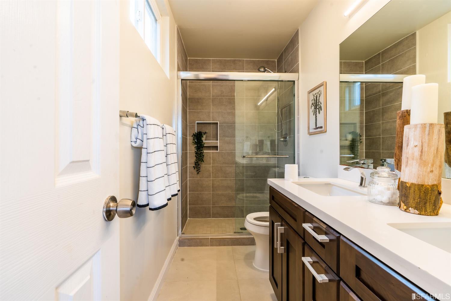 53 Wavecrest Drive Daly City, CA 94015 - Photo 16 of 24 a bathroom with a shower sink and mirror