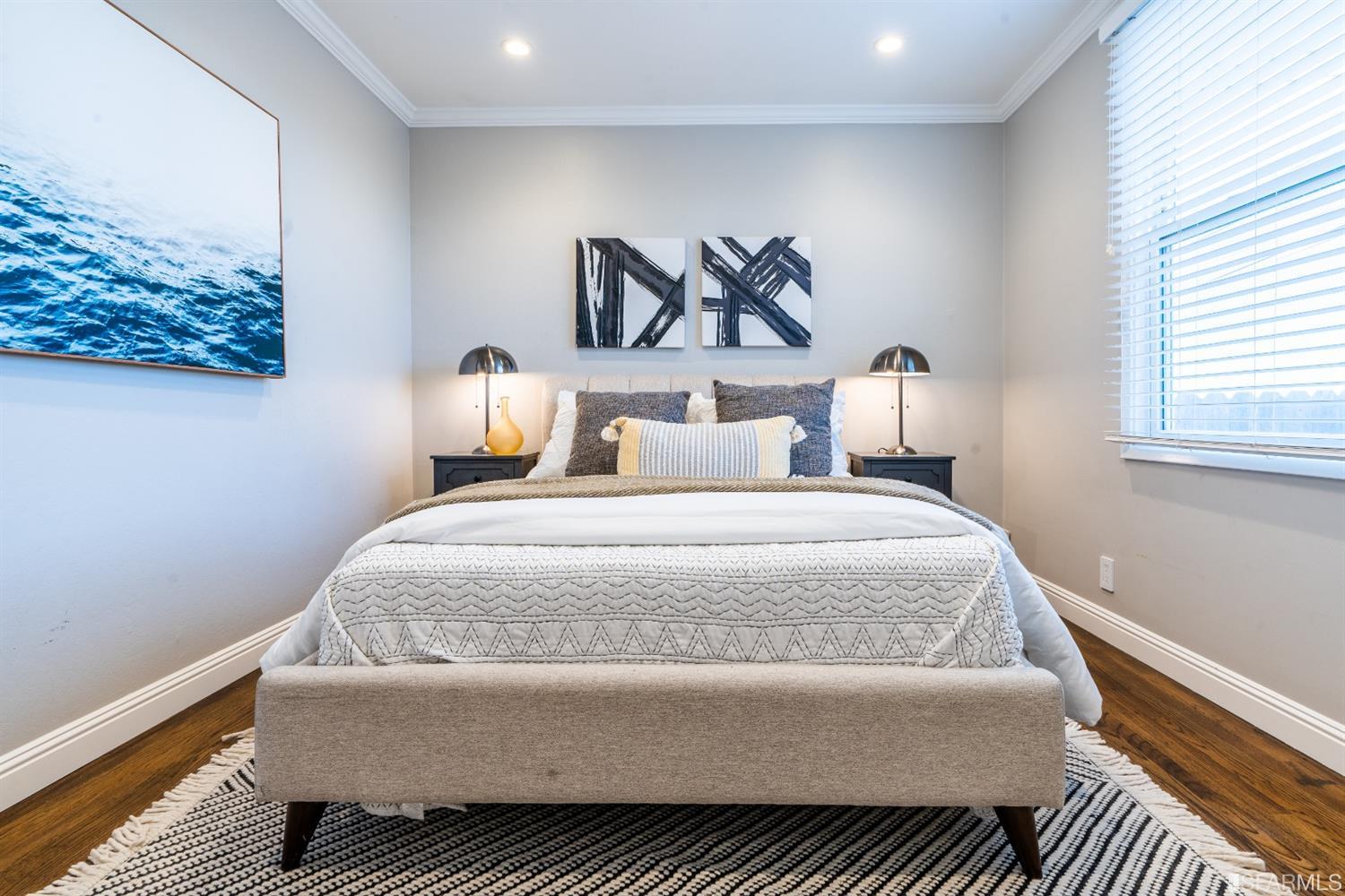 53 Wavecrest Drive Daly City, CA 94015 - Photo 17 of 24 a bedroom with a bed and painting on the wall