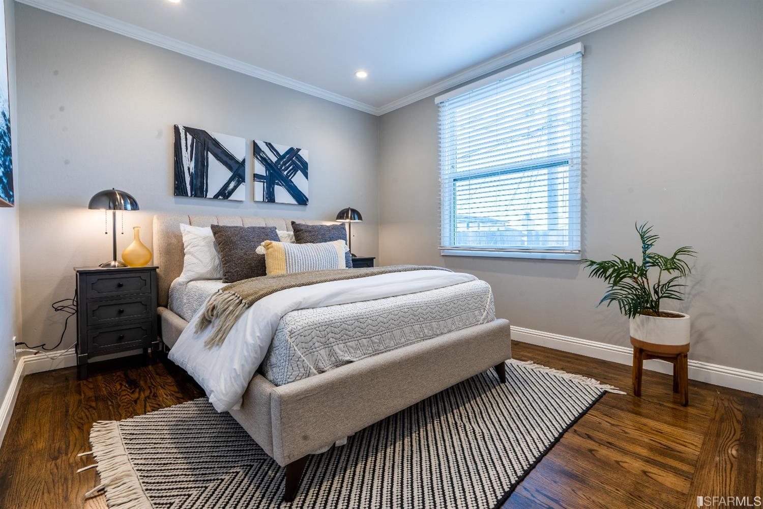 53 Wavecrest Drive Daly City, CA 94015 - Photo 19 of 24 a bedroom with a bed and wooden floor