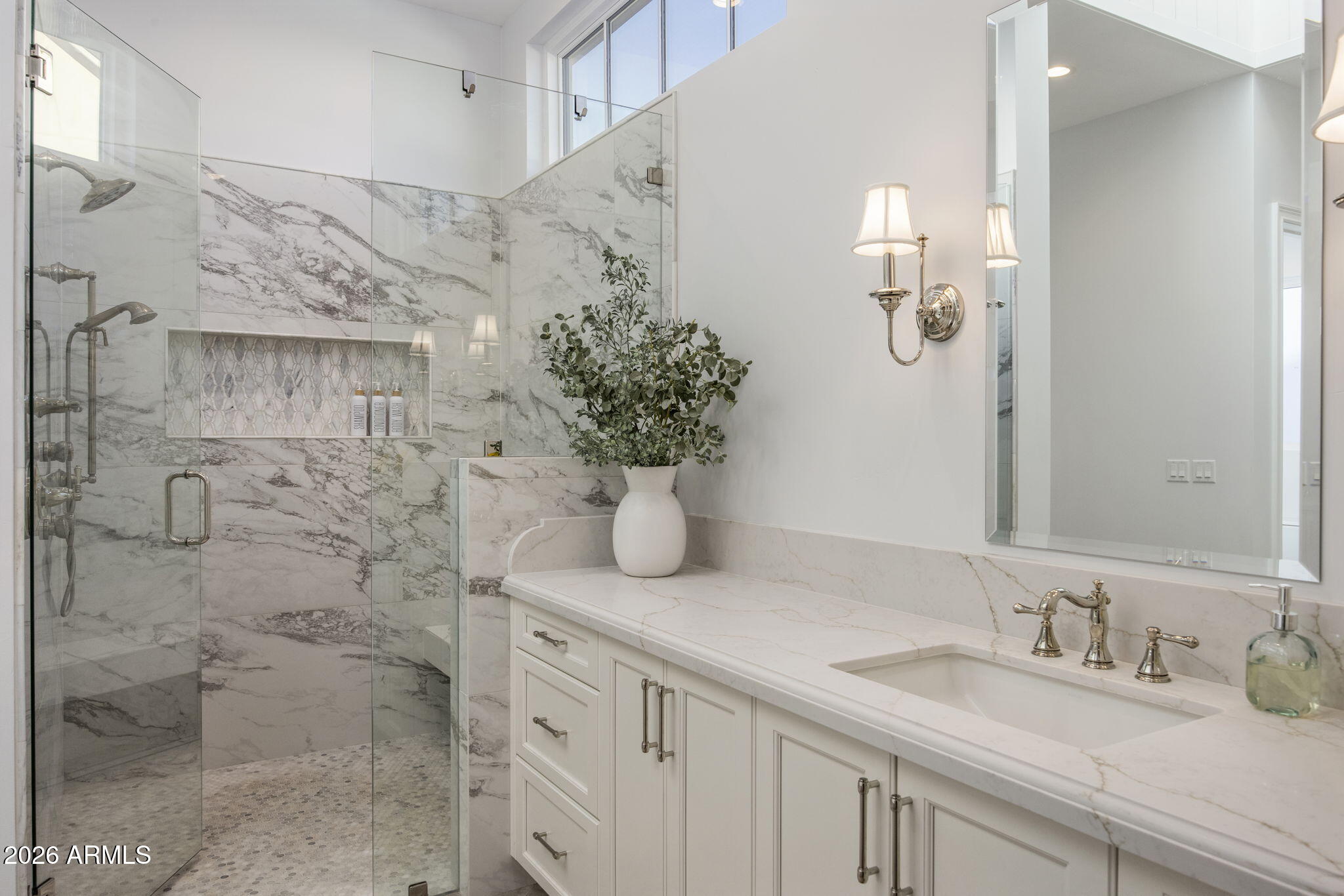 2677 East Maplewood Street Gilbert, AZ 85297 - Photo 9 of 20 a bathroom with a granite countertop sink a mirror and shower