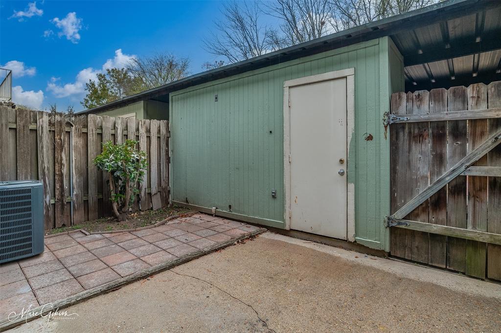 5705 East Texas Street, Unit 80 Bossier City, LA 71111 - Photo 14 of 15 a view of a house with a backyard