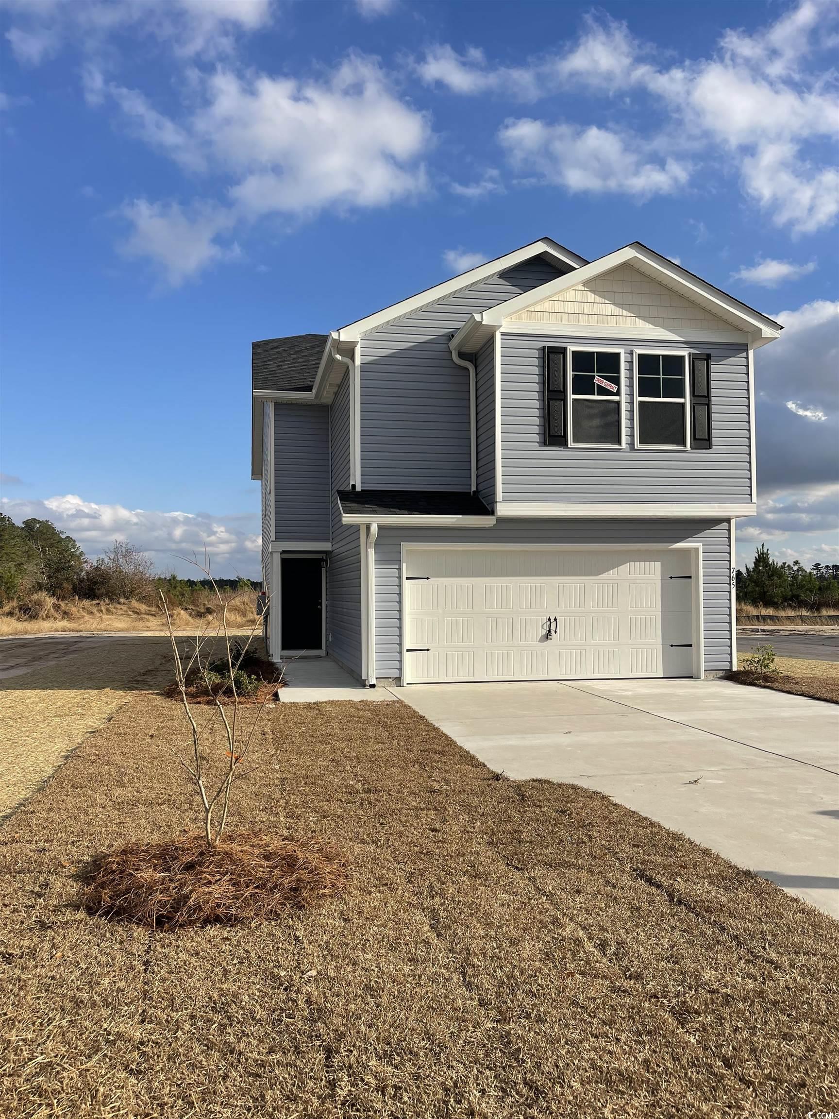 765 Busy Corner Road Conway, SC 29527 - Photo 1 of 4 View of front of property featuring a garage
