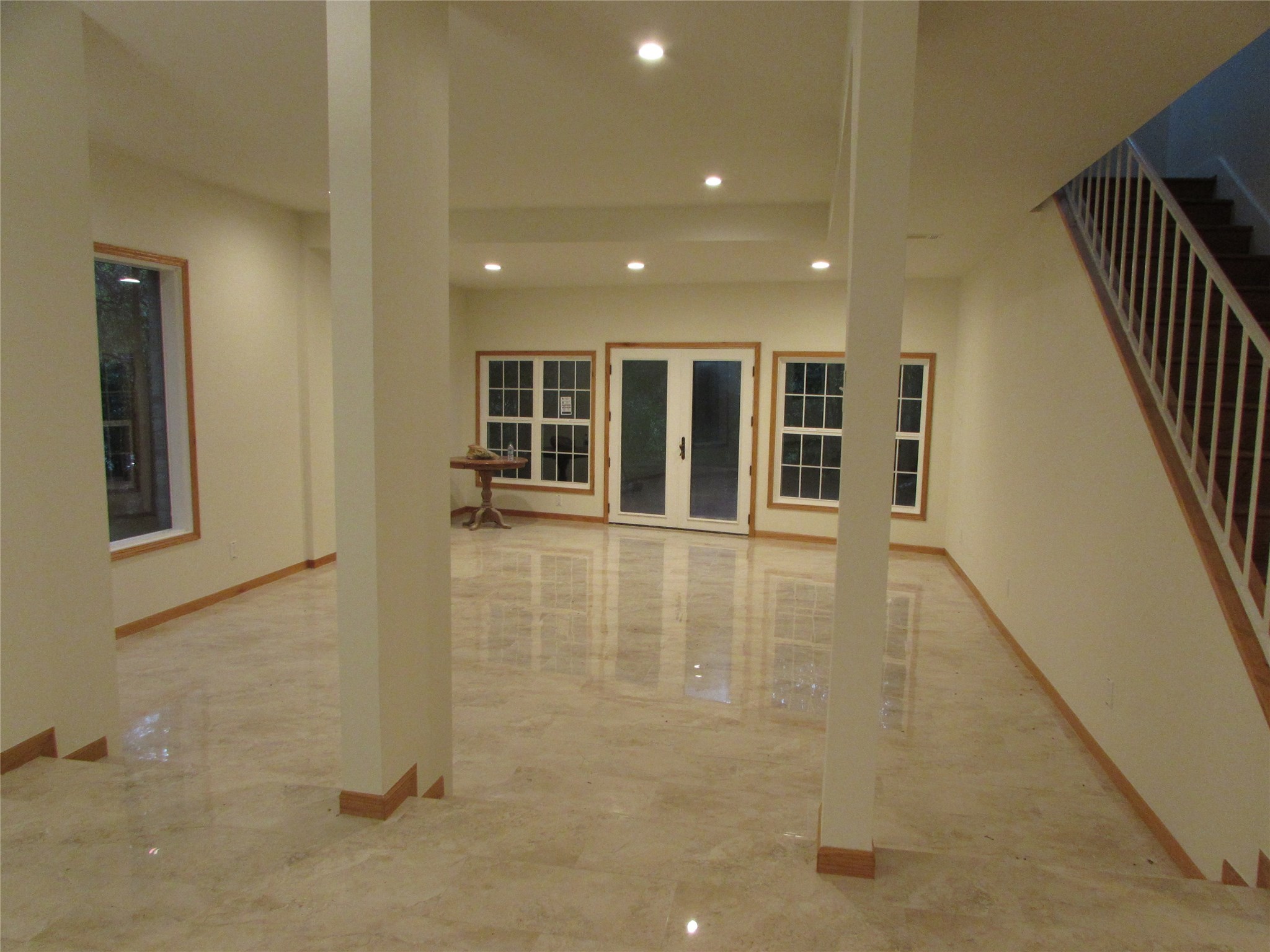 201 Vanderpool Lane, Unit 19 Houston, TX 77024 - Photo 14 of 23 a view of empty room with wooden floor and stairs