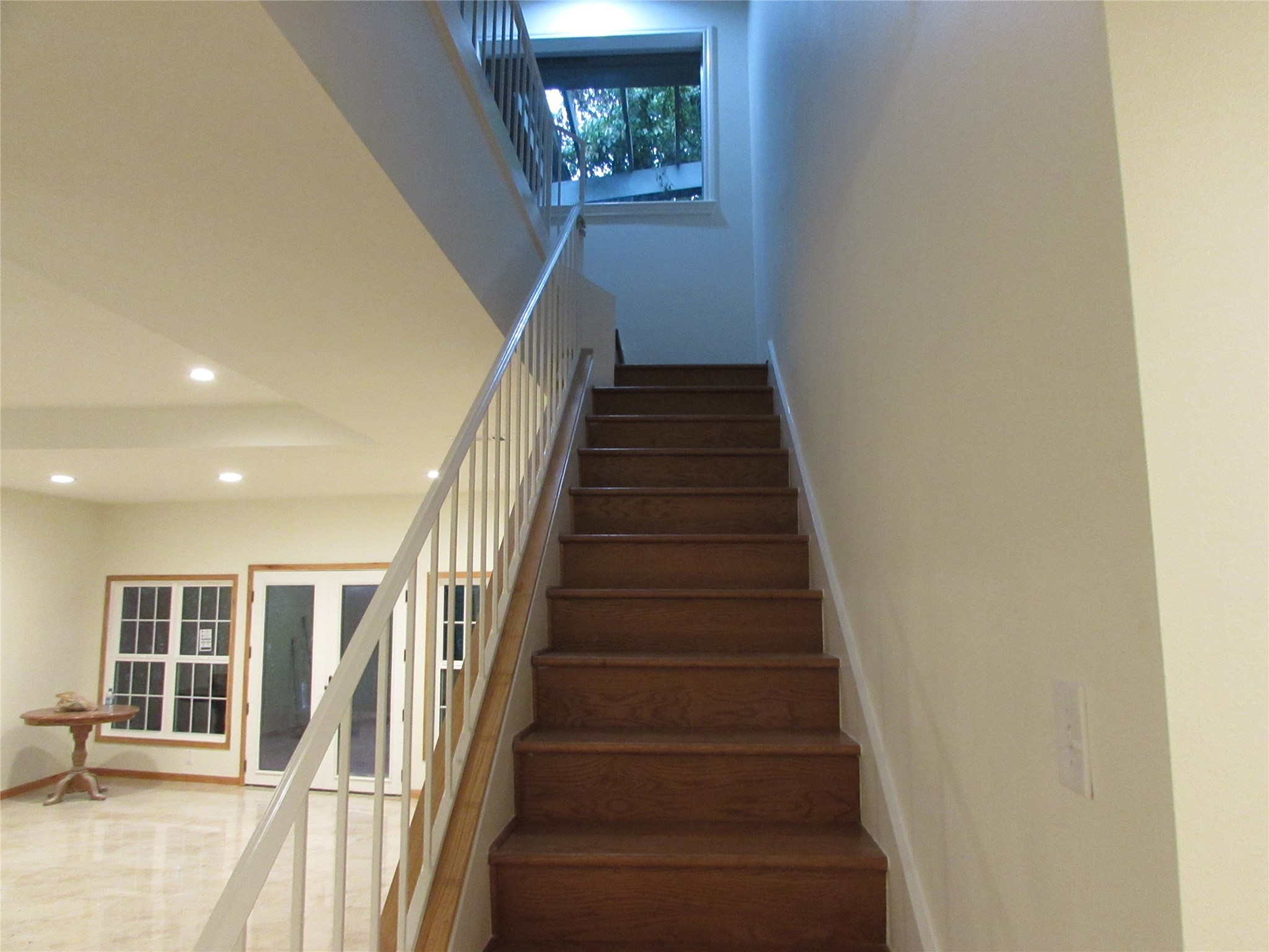 201 Vanderpool Lane, Unit 19 Houston, TX 77024 - Photo 17 of 23 a view of entryway and hall with wooden floor