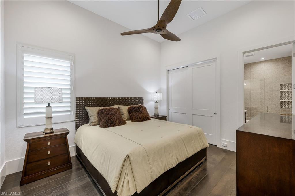 18250 Blue Eye Loop Fort Myers, FL 33913 - Photo 23 of 48 a bedroom with a bed and a closet