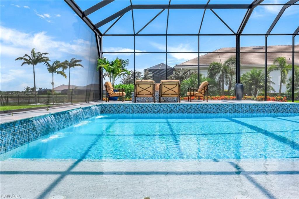 18250 Blue Eye Loop Fort Myers, FL 33913 - Photo 31 of 48 a view of a swimming pool with a patio