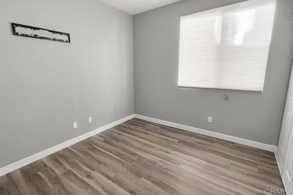 a view of a room that has a window in it