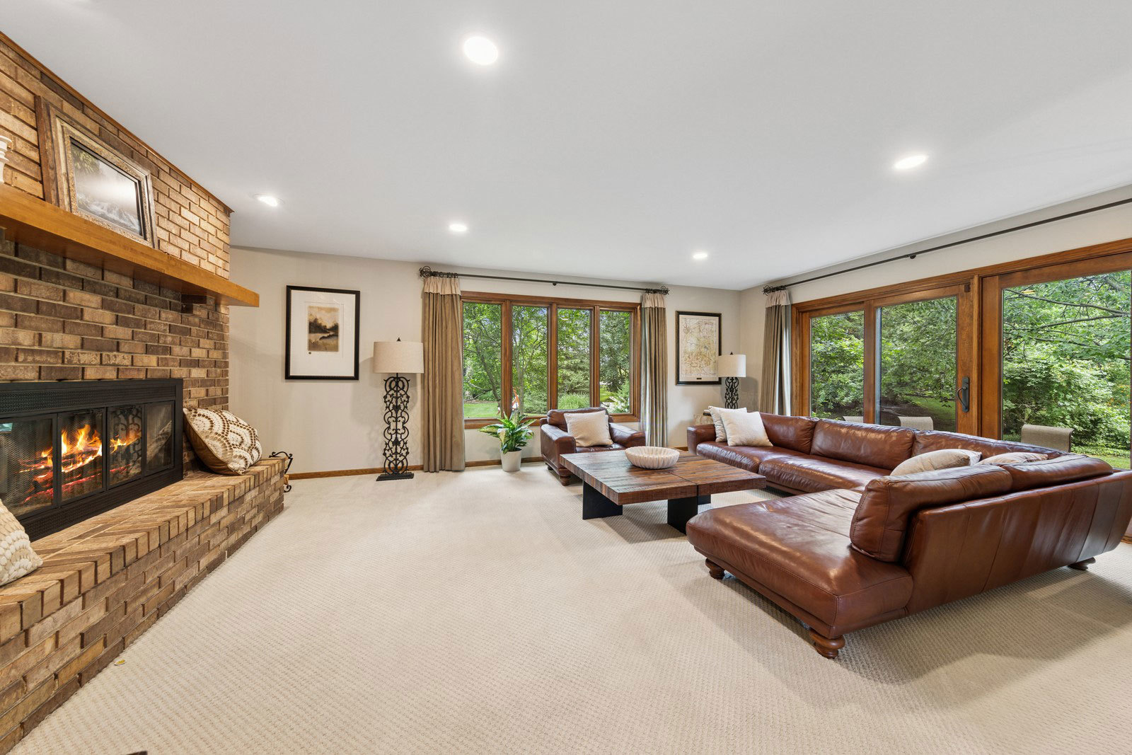 11522 Ridgewood Lane Burr Ridge, IL 60527 - Photo 7 of 47 a living room with furniture and a fireplace