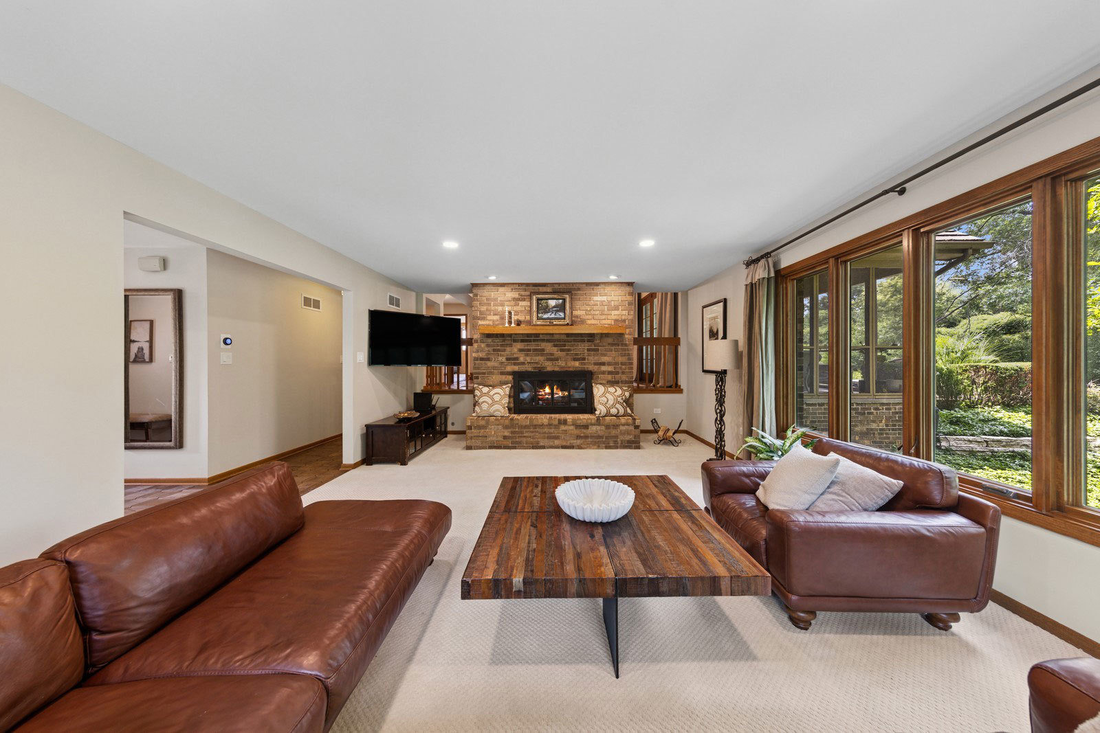11522 Ridgewood Lane Burr Ridge, IL 60527 - Photo 8 of 47 a living room with furniture and a large window