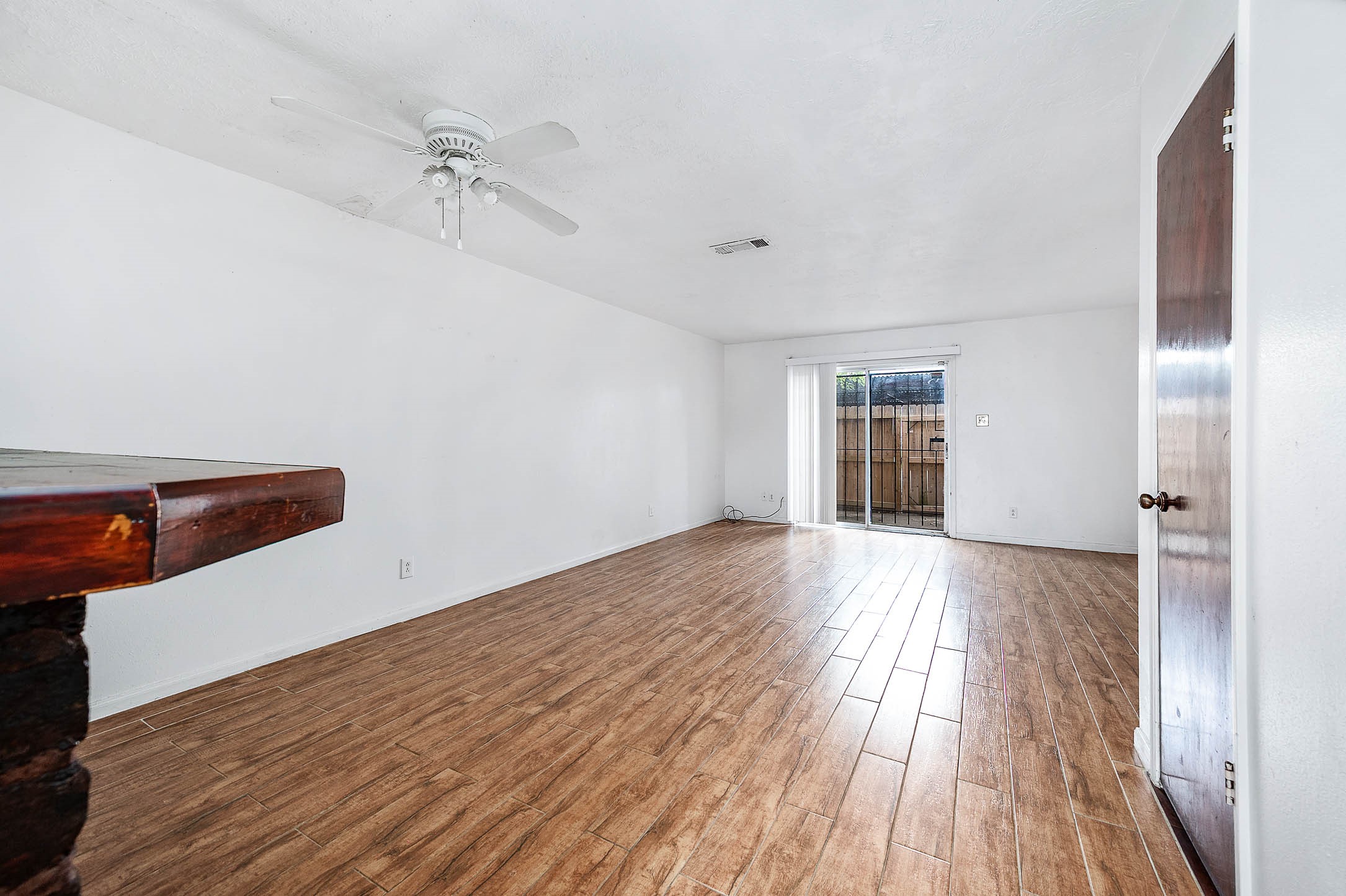 1609 Mapleton Drive Houston, TX 77043 - Photo 8 of 21 a view of a room with wooden floor